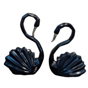 Black geometric swan figurines